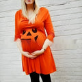 Orange cotton maternity dress on a hanger, suitable for Halloween and seasonal wear.