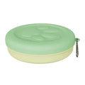 Portable dual-colour dog bowl set with attached snack box in light green and pink.