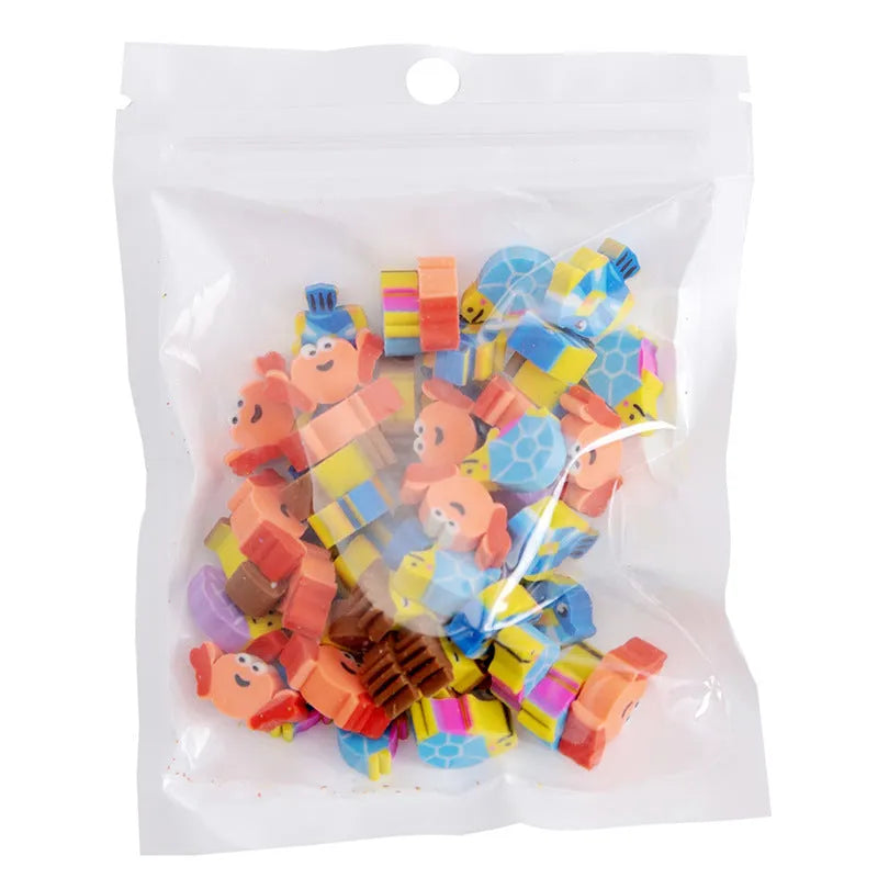 Sealed plastic bag containing 50 small cartoon-themed erasers in shapes like fruits, animals, and Christmas symbols.