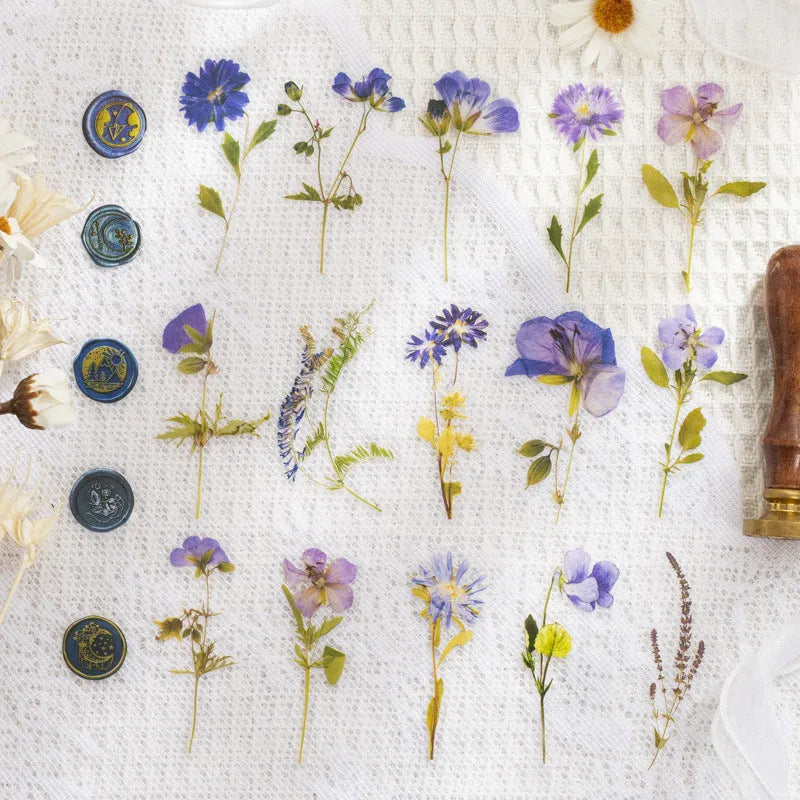 Set of 40 printed PET decorative stickers showing eight artistic styles including dried flowers and leaf specimens.