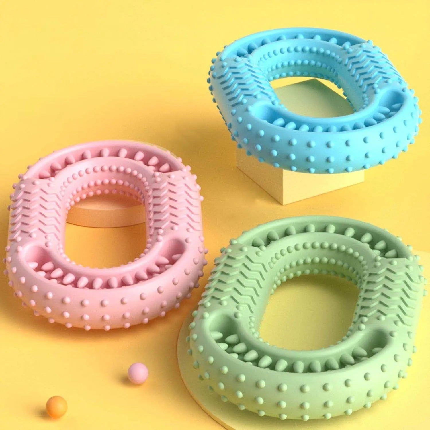 Blue resistant O-ring shaped dog chew toy for aggressive chewers on white background
