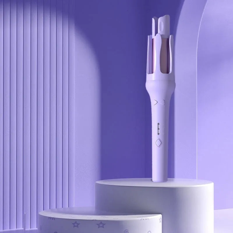 White and pink automatic hair curler with 32mm ceramic barrel and auto-clamp feature on a table.