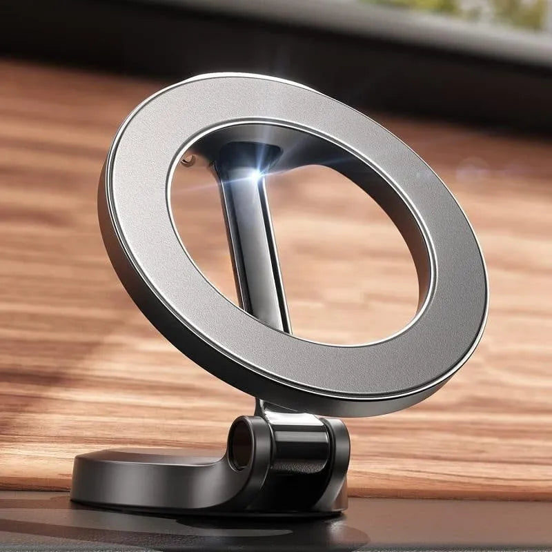 All-metal foldable magnetic car phone mount in Qian Colour on a dashboard.