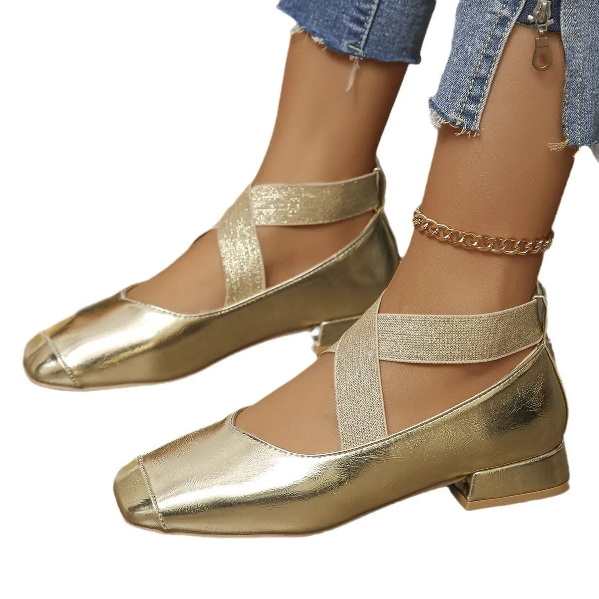 Gold women's slip-on evening pumps with skirt detail, square toe, and low rubber heel