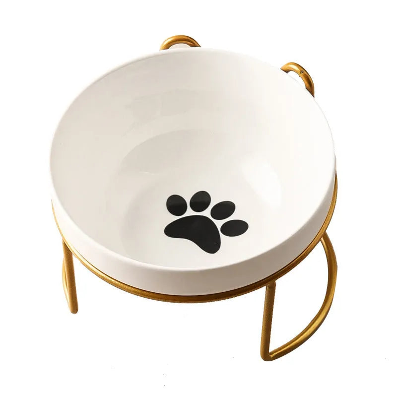 Ceramic cat bowl in an iron frame, showing cat paw print and fishbone pattern options