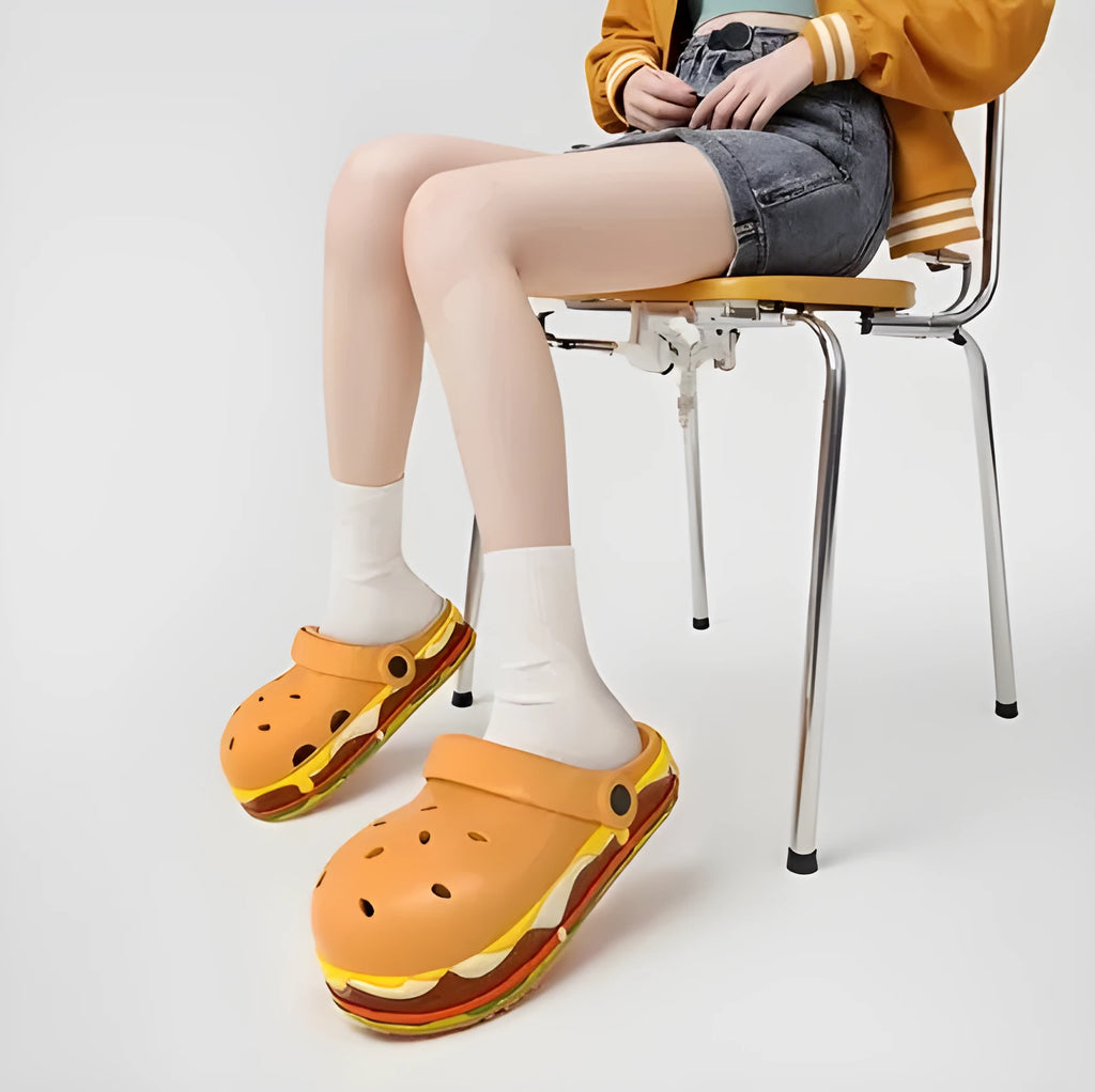 Women's thick soled EVA sandals with hollow out design and covered toe cap.