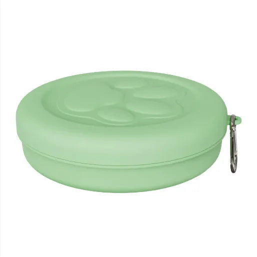 Portable dual-colour dog bowl set with attached snack box in light green and pink.