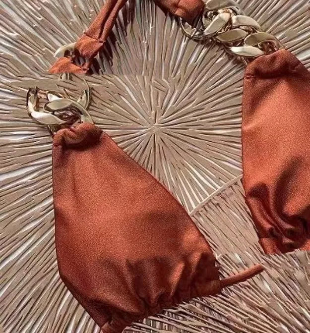 Brown women's tube-top bikini with adjustable ring tether at the back and push-up padding.