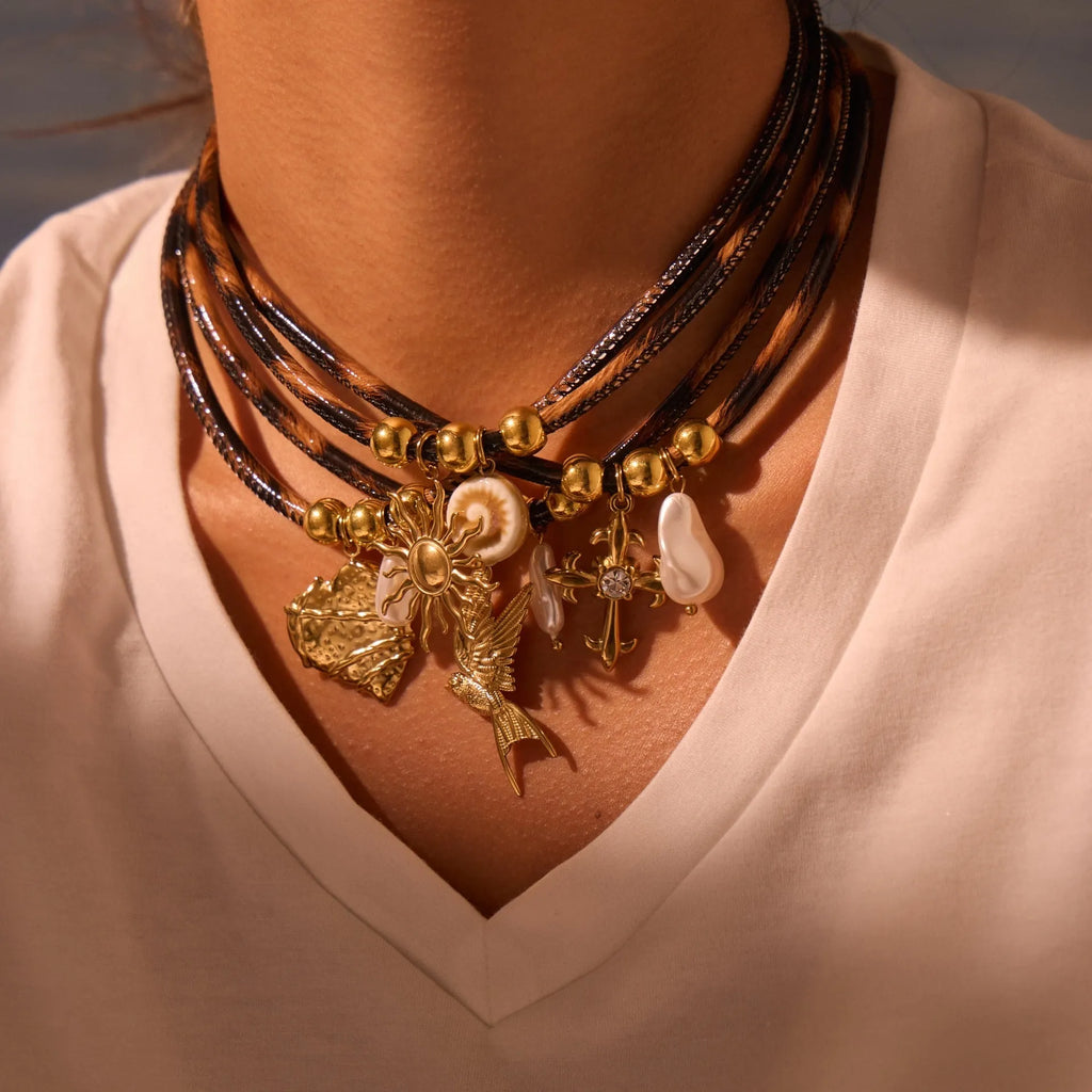 Geometric leopard head stainless steel necklace with gold electroplated finish on adjustable chain