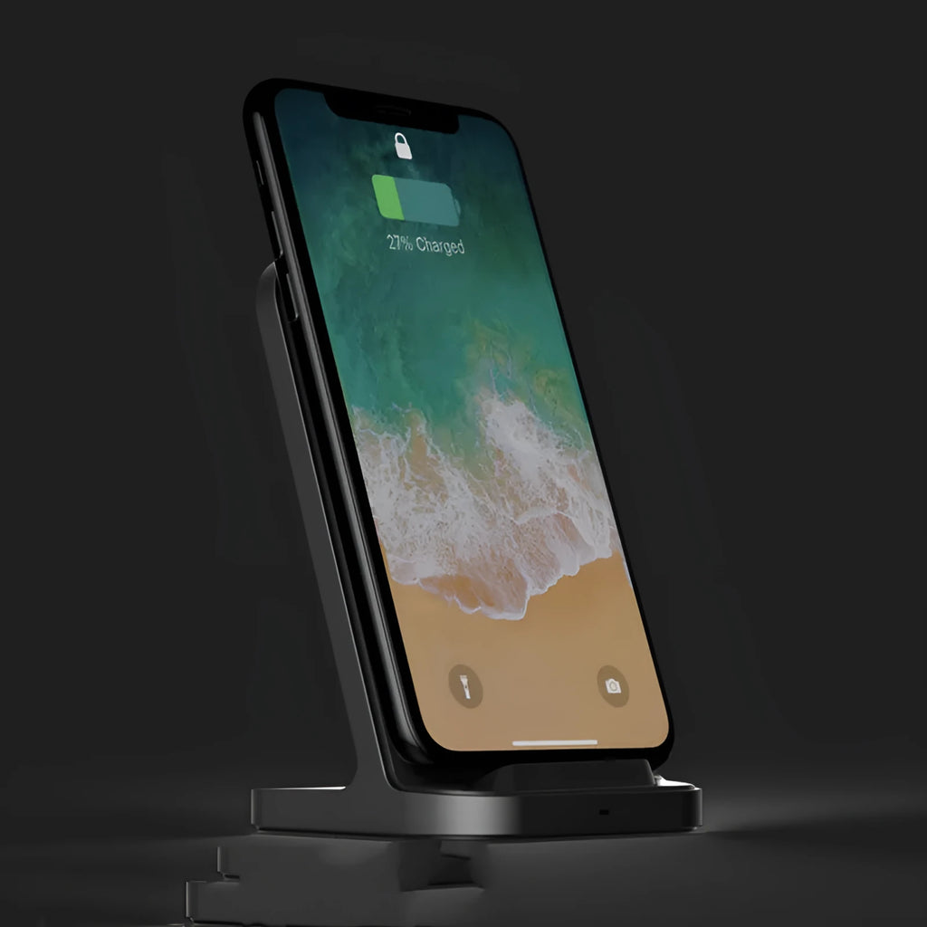 Dark grey vertical wireless charging stand for Apple phones measuring 70x70x113 mm