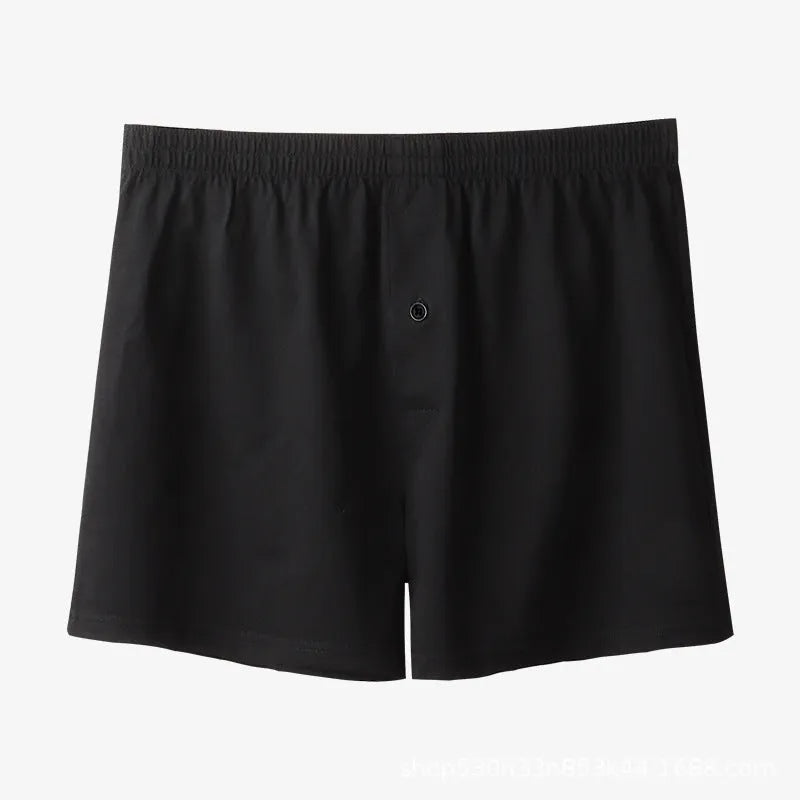 Men's pure cotton boxer shorts in black colour showing loose fit and high waist design