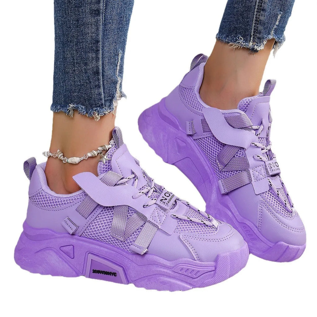Women's green platform mesh sports shoe with lace-up front and thick sole