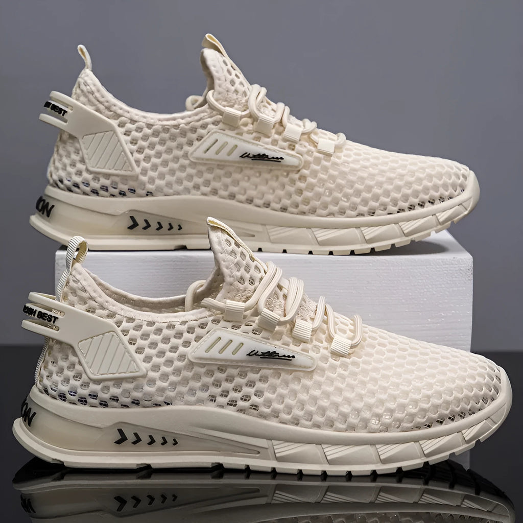 Men's beige casual sneakers with mesh lining and lace-up front on a grey background