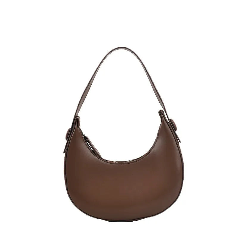 Women's retro brown dumpling-shaped PU leather shoulder bag showing front and internal zipper pocket.