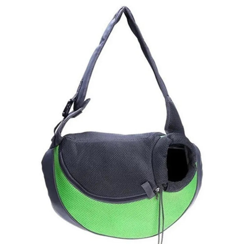 Blue pet carrier backpack for a small dog, showing padded interior and shoulder straps.