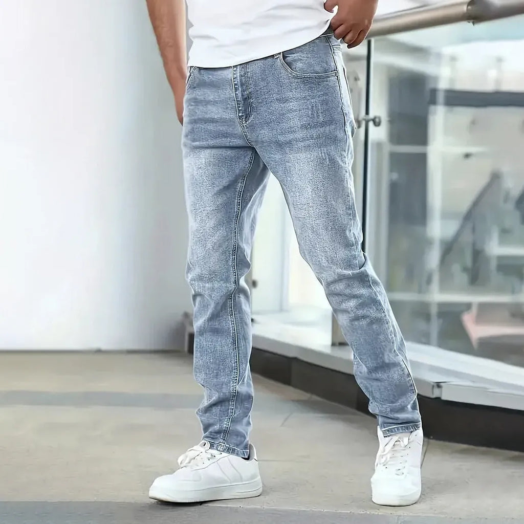 Men's stretch cotton jeans in straight leg cut available in black, dark blue and grey colours