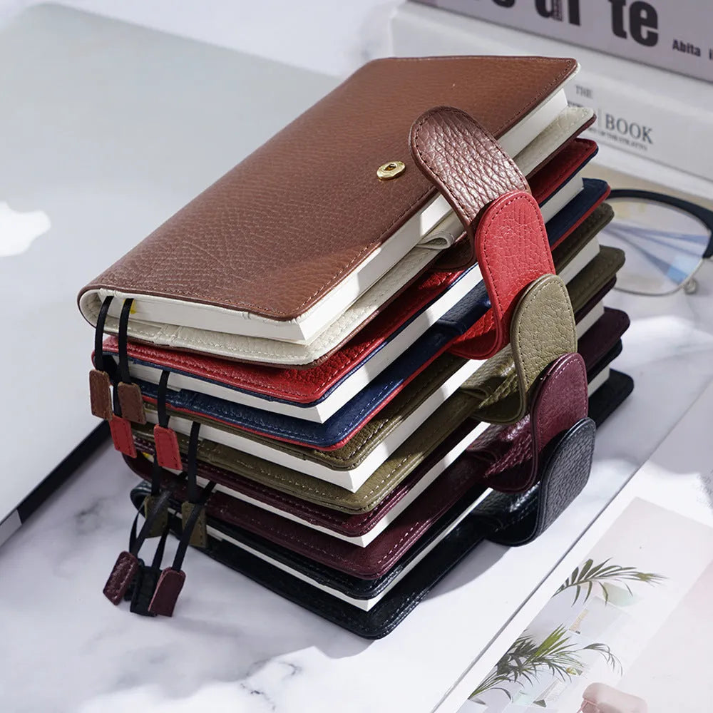 A6 loose-leaf diary with cowhide leather cover showing lychee pattern texture