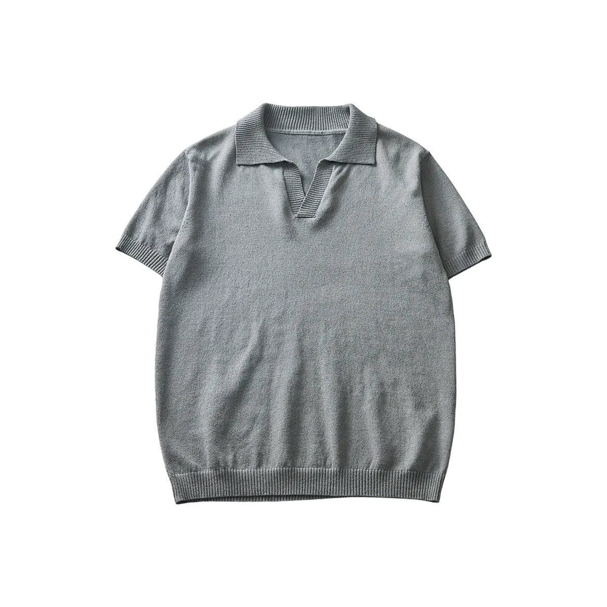 Short-sleeved polo collar casual t-shirt in solid colours on a hanger.