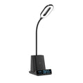 Modern minimalist desk lamp with wireless charging pad and integrated pen holder storage box.
