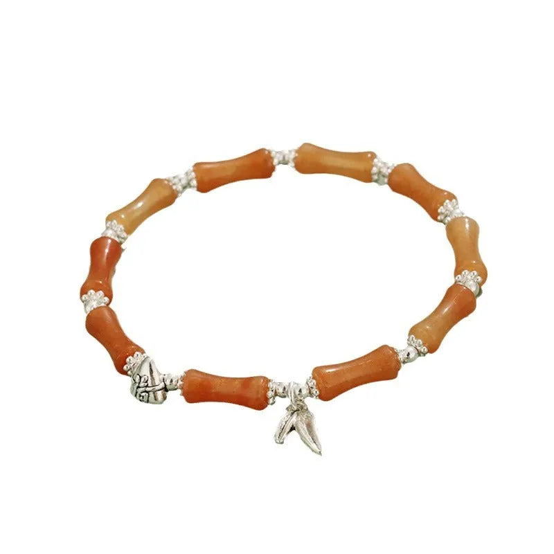 Green aventurine bamboo strawberry crystal bracelet with mixed stones and adjustable sizing