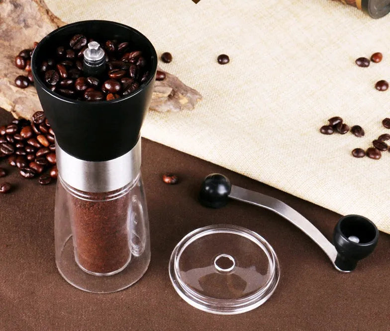 Hand coffee grinder 6cm by 17cm 310g black manual burr grinder on white background
