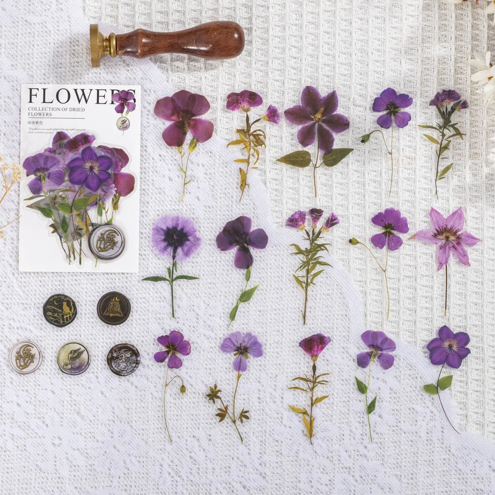 Set of 40 printed PET decorative stickers showing eight artistic styles including dried flowers and leaf specimens.