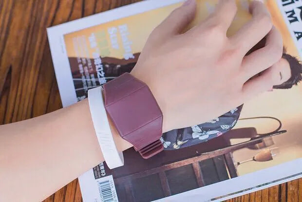Square electronic touch screen watch with digital display on a PU strap, shown in multiple colour options.