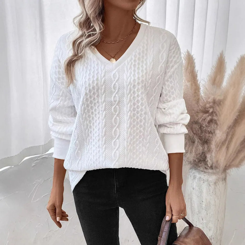Milky white loose long sleeve T-shirt with a textured 3D pattern on the front.