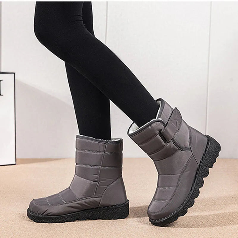 Women's waterproof snow boots with canvas upper, PU sole, buckle closure, and belt decoration