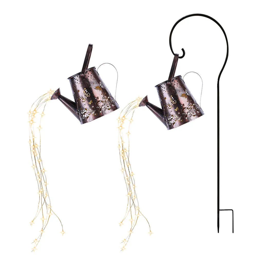 Iron solar garden lamp with tapered butterfly pattern and warm white LED light.
