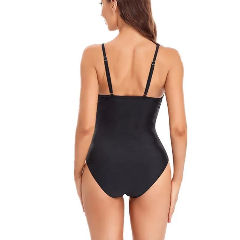 Women's solid colour one-piece swimsuit with mesh panels and backless design in spandex fabric
