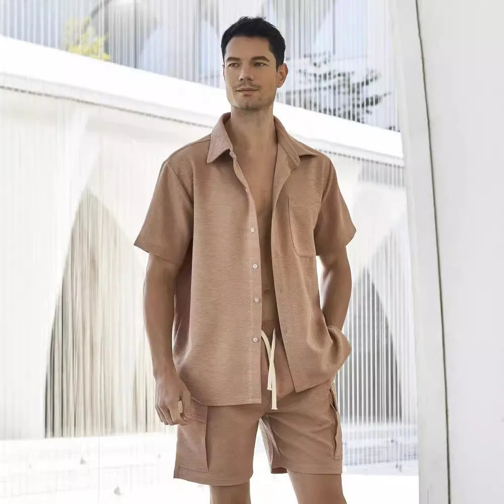 Plain polyester elastic waist shorts and short sleeve top co-ord set in beige colour.