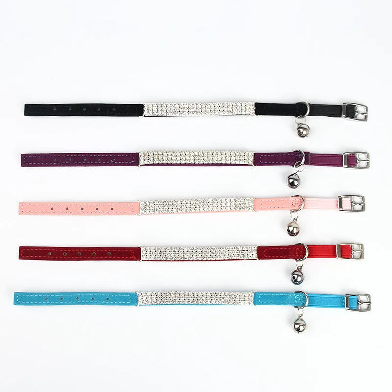 Red velvet suede cat collar with a central silver rhinestone, showing adjustable buckle on a 1cm wide band.