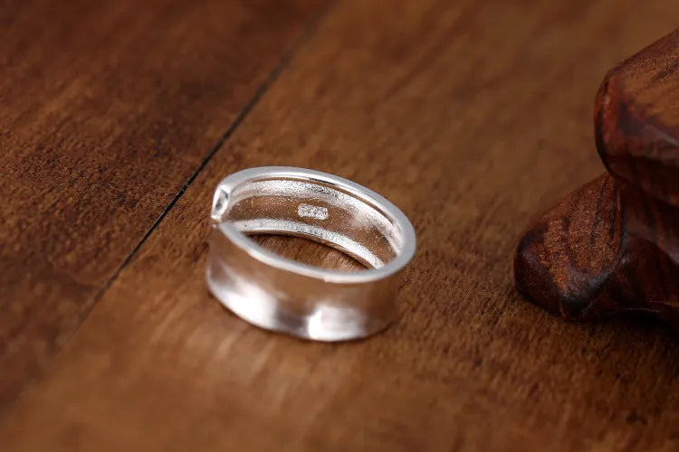 Frosted sterling silver open ring with geometric design and adjustable opening