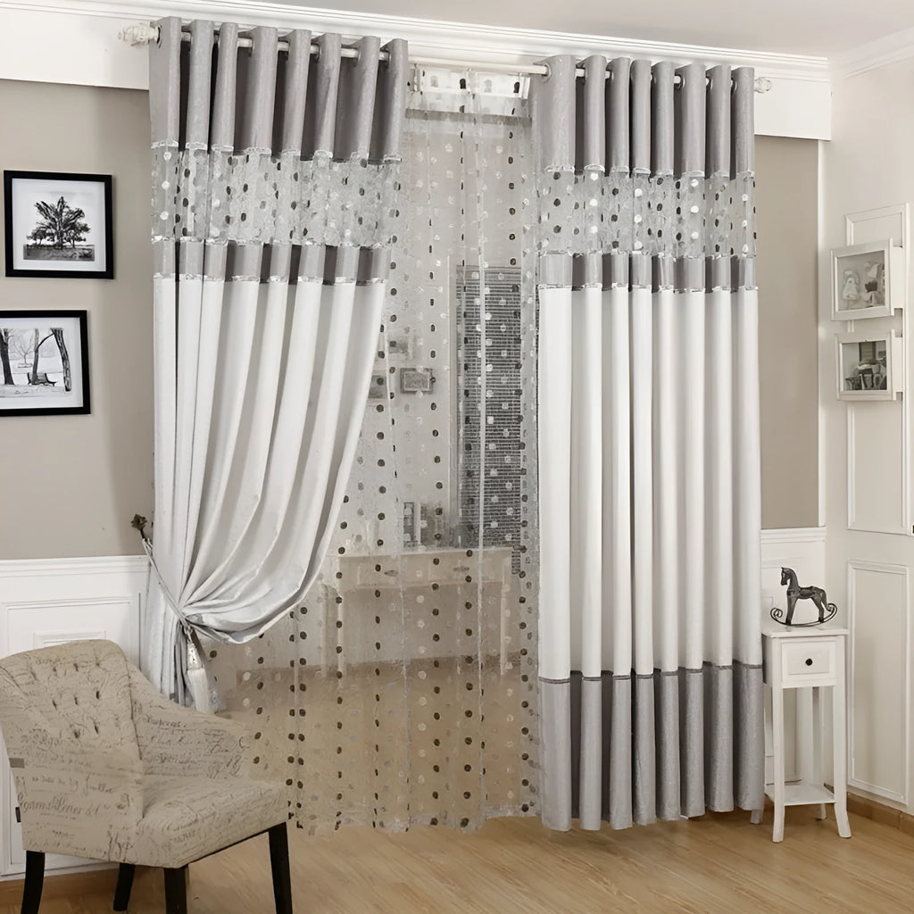 A simple blackout curtain panel hanging on a pole, demonstrating one of the hook, Korean hook, or ring attachment styles.