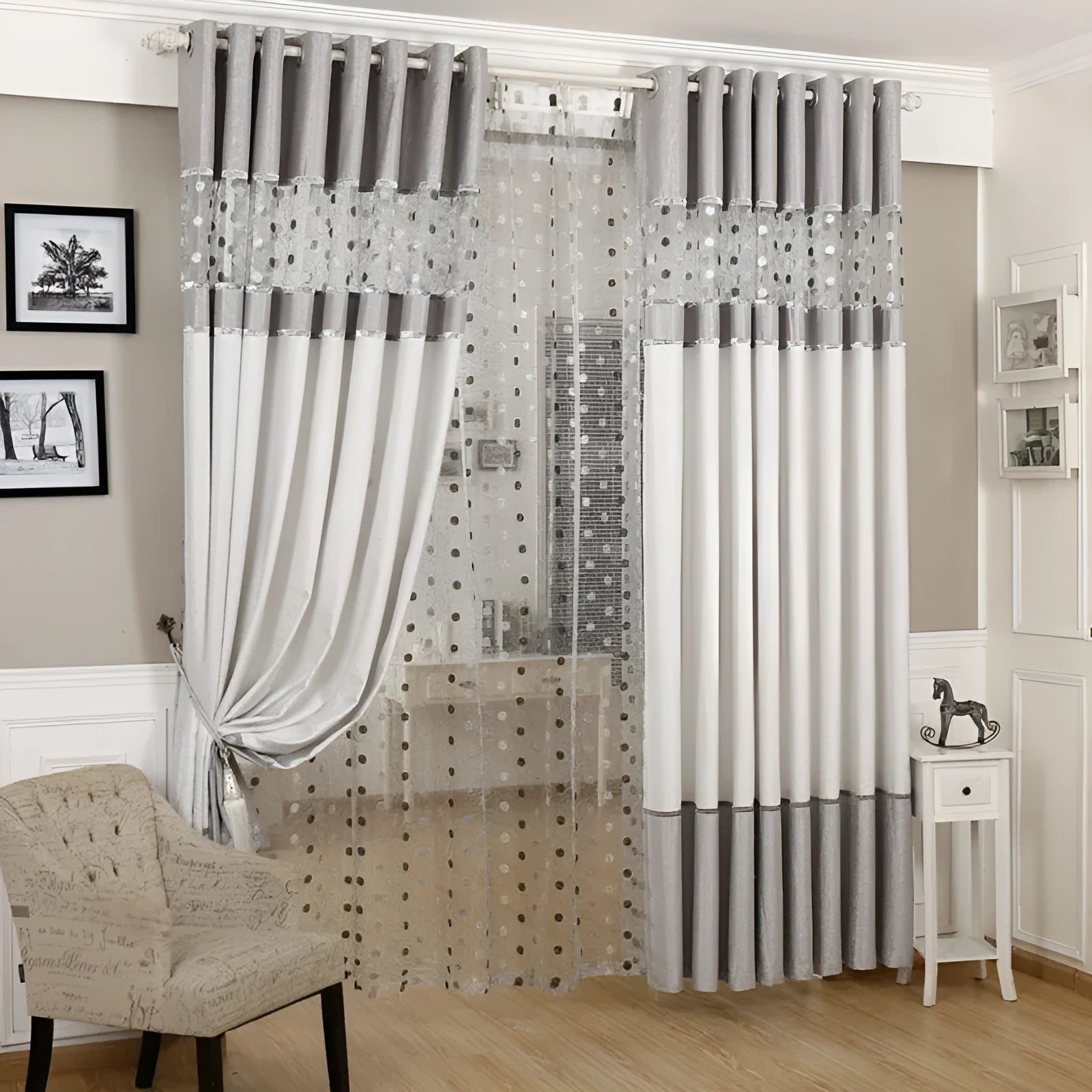 A simple blackout curtain panel hanging on a pole, demonstrating one of the hook, Korean hook, or ring attachment styles.