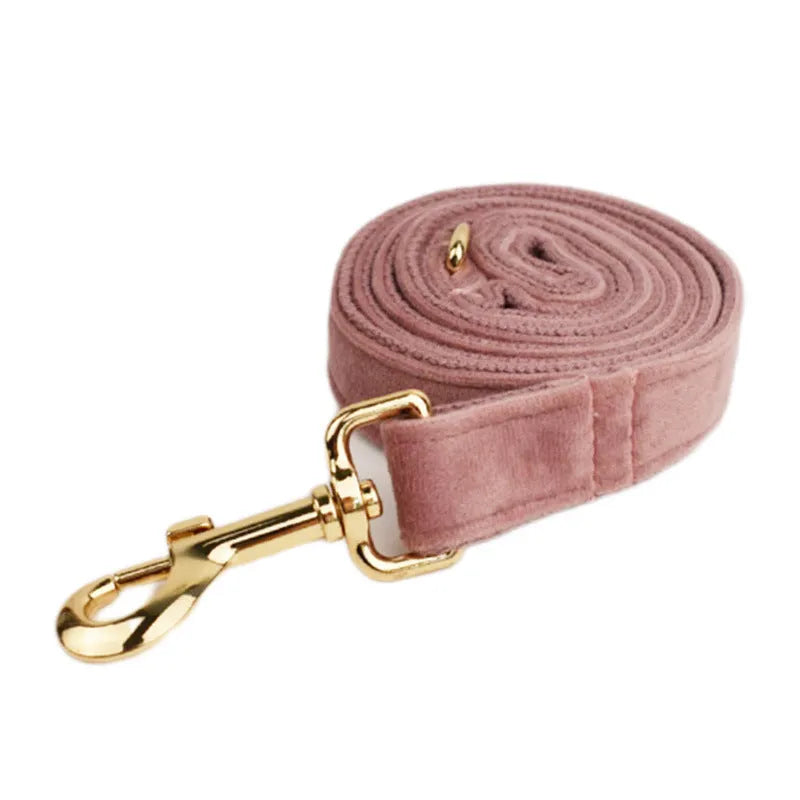 Light purple pink velvet dog collar with matching cloth accessories including leash and bow tie