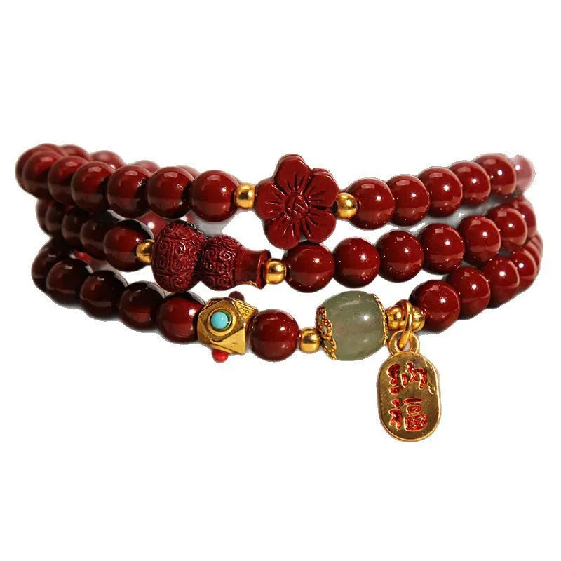 6mm cinnabar bracelet with multi-circle gourd and five petal flower Chinese design in polished finish