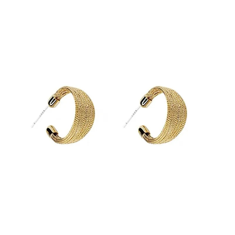 Copper geometric multi-layer bracelet earrings with electroplated silver and gold finish showing stud and clip pieces