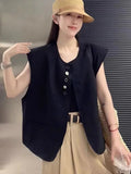 Women's loose fit vest with 40cm short length in milky white colour showing pocket detail