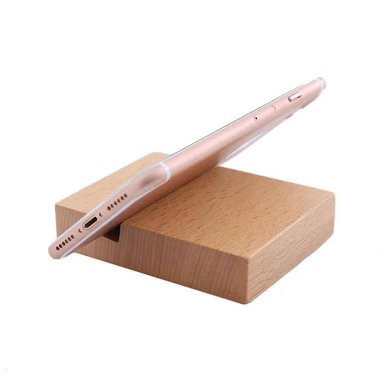 Handcrafted beech wood and resin lazy bracket mobile phone holder on a wooden desk