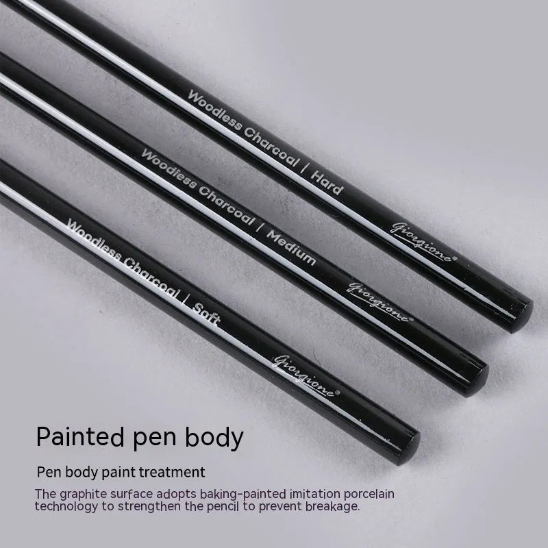 Set of six graphite and three carbonised art pencils in suction card packaging.