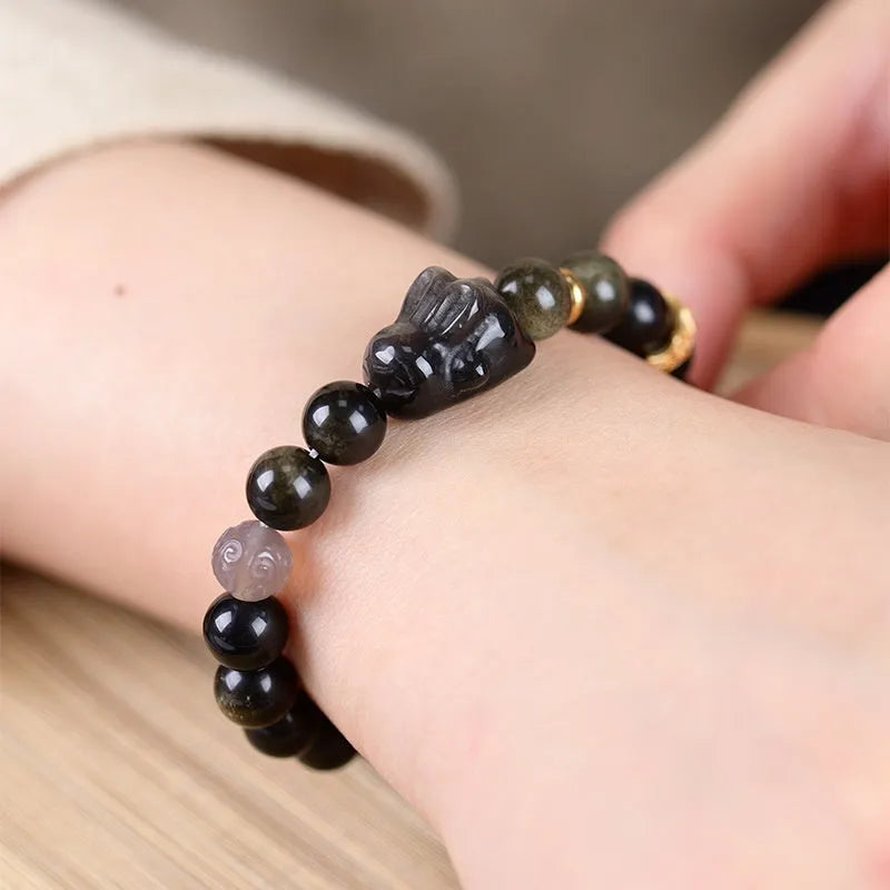 Handmade national style bracelet with a lying rabbit Jin Yaoshi charm and gray agate beads.