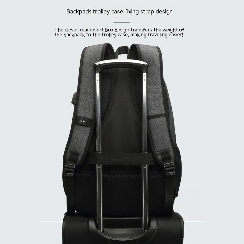 Grey lightweight nylon USB charging backpack with trolley sleeve, shown next to a phone and power bank.