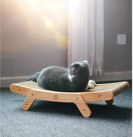 Deformation cat bed and scratcher in primary colour with corrugated paper surface, pine frame and three adjustable angles.