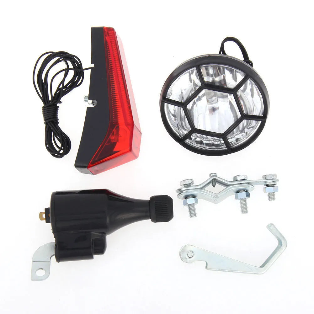 Silver bicycle dynamo-powered generator light with friction drive for front and rear lighting