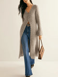 Khaki long sleeve coat cardigan with button front, shown in a retro elegant style.