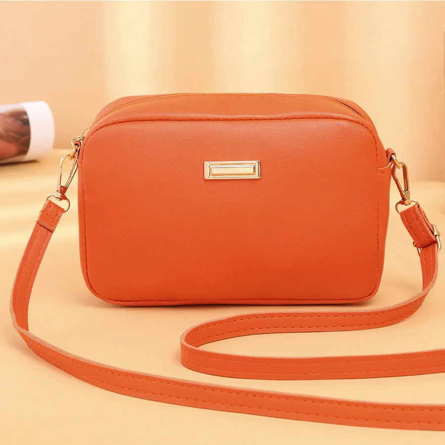 Women's solid colour PU shoulder bag with three-dimensional pocket in urban simplicity style