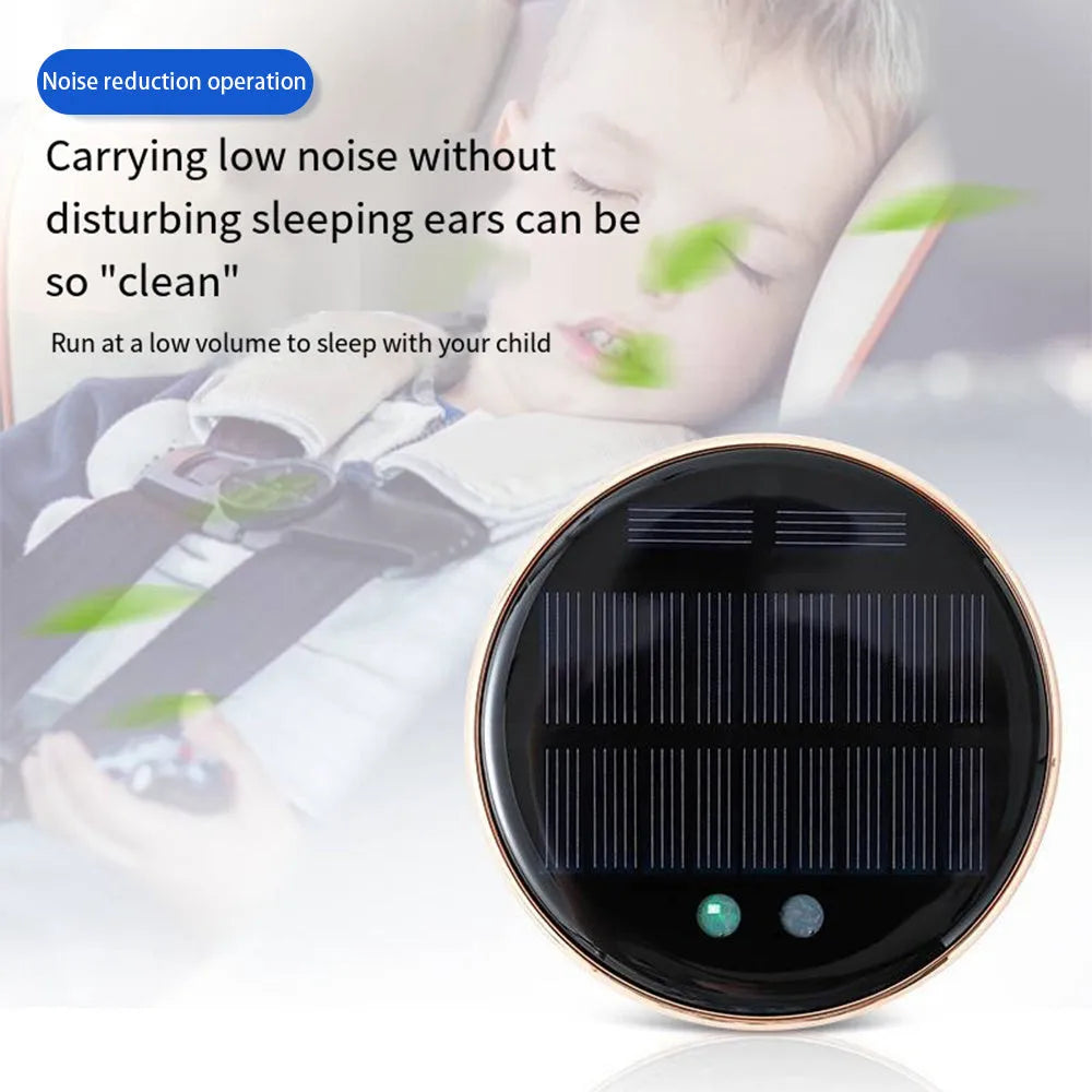 Black solar-powered car humidifier mounted in a vehicle air conditioning vent.