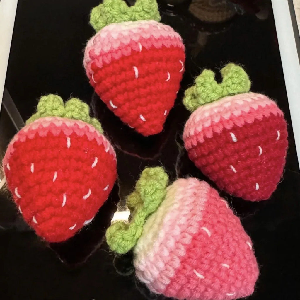 Plush wool strawberry pendant keychain charm in pink or red colour.